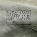 Close-up of the Romanian Army Parka M93 fabric stamp showing size and manufacturing details on olive-green material.