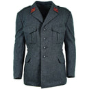Vintage Swiss army wool jacket in grey with chest pockets and military insignia on collar tabs.
