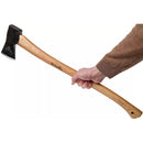 Hand holding HULTAFORS Qvarfot felling axe with long hickory shaft and sharpened carbon steel head