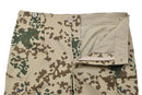 Close-up of Leo Kohler military tactical field pants in Tropentarn desert camouflage with button and zipper details.