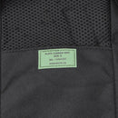 Close-up of a black MIL-TEC Gen II military plate carrier vest label with mesh and durable fabric details.