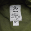 Close-up of a 2010 Denmark military hat label showing fabric composition and size 57 in olive green fabric.