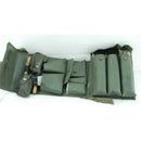 Military-style green leather boot polish and cleaning kit with brushes and applicators in a foldable case