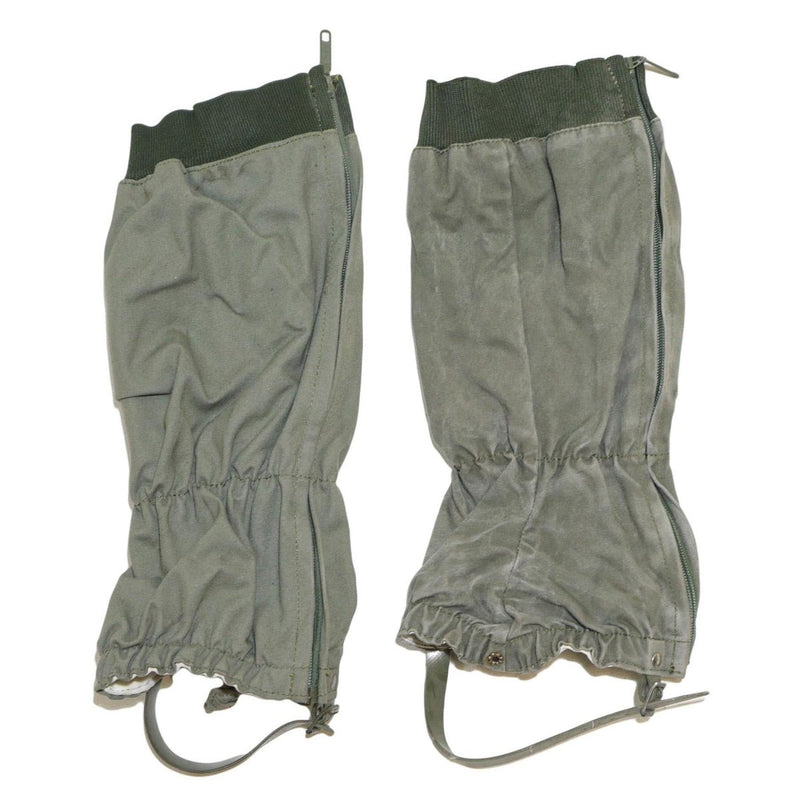 Pair of authentic olive drab French military combat gaiters with side zippers and adjustable straps for secure fit