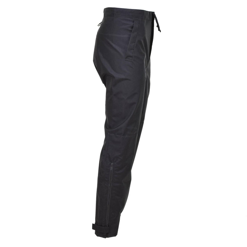 Side view of black Genuine British Metropolitan police waterproof outdoor rain trousers