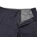 Close-up of navy blue Genuine British police waterproof rain trousers with zipper and adjustable waist tabs open