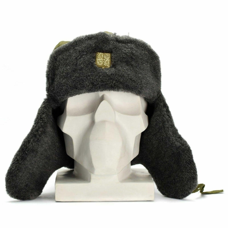 Vintage Czech army Ushanka winter hat in grey faux fur with olive fabric and gold badge on mannequin head