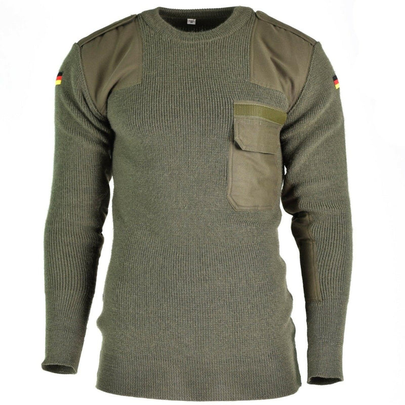 German army pullover commando jumper in olive green wool with shoulder patches, chest pocket, and German flag insignia on sleeves