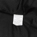 Close-up of breathable black mesh lining with care label on genuine German Bundeswehr sports jacket.