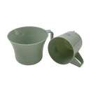 Two olive green German military plastic camping cups with handles shown from different angles