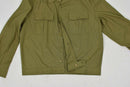 Khaki Hungarian army officer shirt with long sleeves, buttoned pockets, and durable military fabric laid flat.