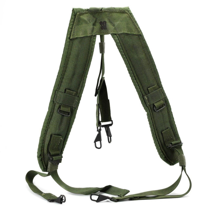 Genuine US Army LC-2 military belt suspenders in olive green with padded straps and ALICE attachment clips for heavy load.