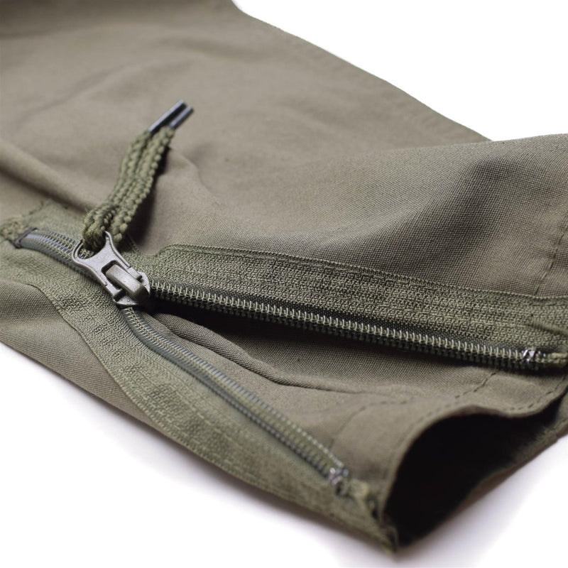 Close-up of olive green Mil-Tec coverall sleeve featuring a sturdy zipper and durable fabric stitching