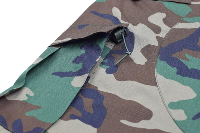 Close-up of adjustable waist and bottom cuffs on Mil-Tec U.S. Military-style woodland camo ripstop cargo pants