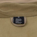 Close-up of MIL-TEC jacket label showing size medium and fabric composition of polyester and elastane.