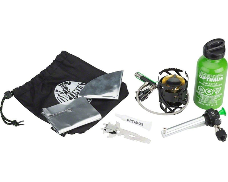 Optimus Polaris multi fuel camping stove with fuel bottle, windscreen, pot supports, and carrying bag displayed on white background.