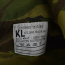 Close-up of the Dutch Army M65 woodland DPM shirt fabric label showing composition and care instructions