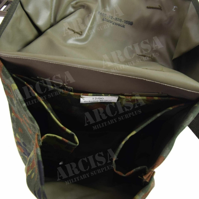 Close-up of original German army Flecktarn camouflage Cordura nylon webbing rig system showing interior compartments and stitching details