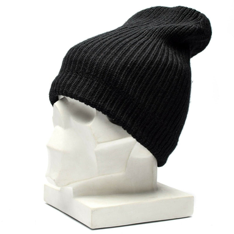 Vintage black German army winter hat knitted beanie with windproof lining displayed on white mannequin head