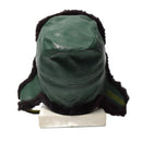 Original German military winter ushanka hat with green faux leather and black faux fur lining and ear flaps for cold weather.