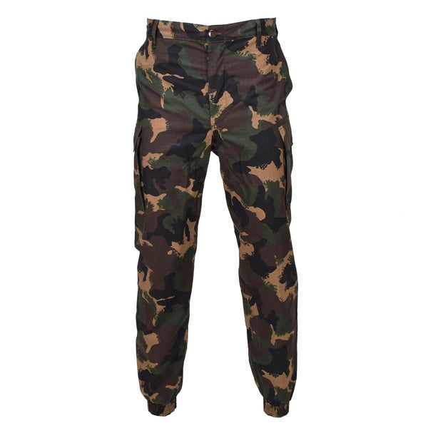 Original Hungarian M1990 military summer camo cargo pants made of durable ripstop fabric with multiple pockets.