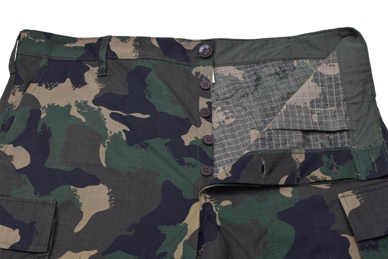 Hungarian M1990 woodland camo ripstop military summer cargo pants with button fly and durable fabric close-up view