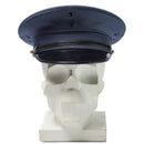 Original Korean Army officer visor peaked cap in blue wool blend with black visor and chin strap displayed on skull model