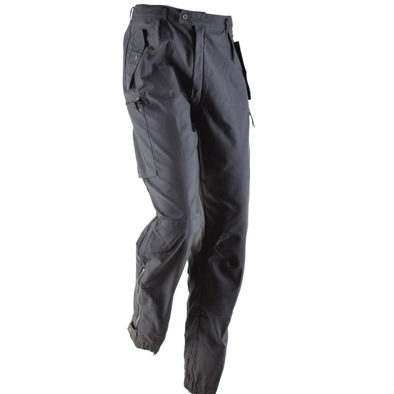 Black Original Swedish Army M90 thermal combat pants with cargo pockets, durable fabric, and adjustable cuffs for cold weather use.