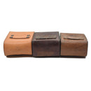 Three vintage Swedish military hard leather belt magazine pouches in various shades of brown with belt loops.