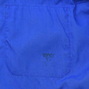 Close-up of the original Swedish Military sports jacket blue retro tracksuit pocket with faded emblem detail.