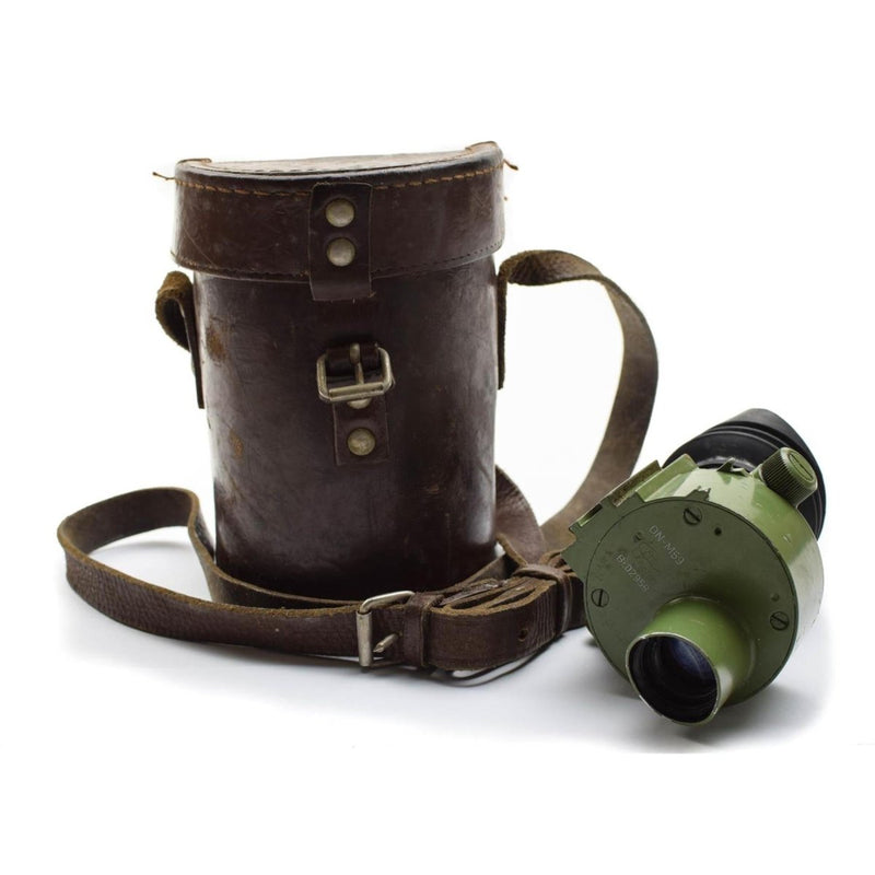 Original Yugoslavian army ON-M59 monocular sight with green metal body and worn brown leather carrying case.