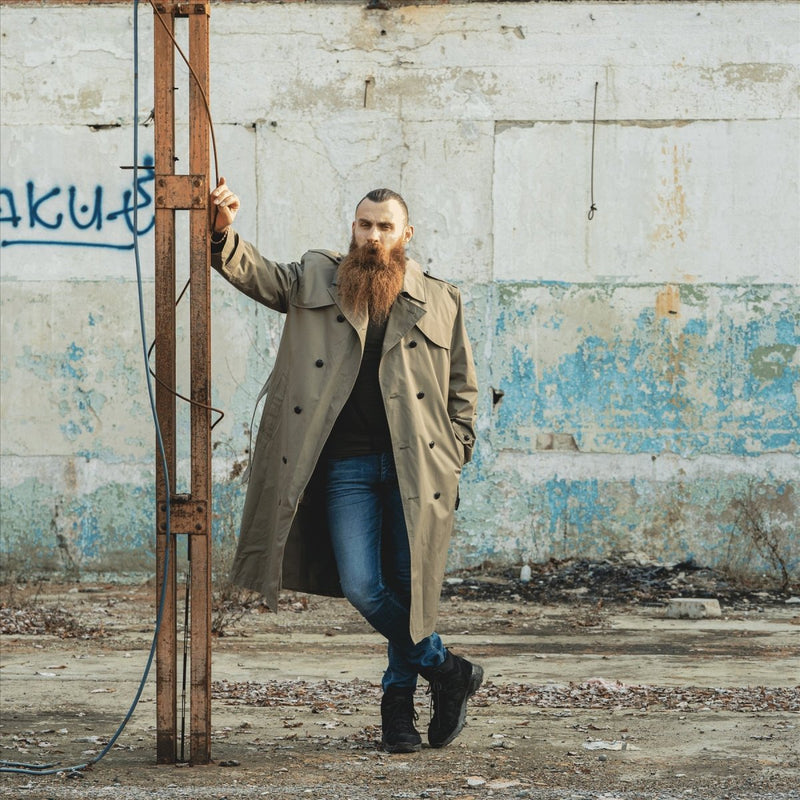 Dutch army Coat Khaki long officer trench coat with lining coat  a man with long beard and long coat leaning on a metal pole